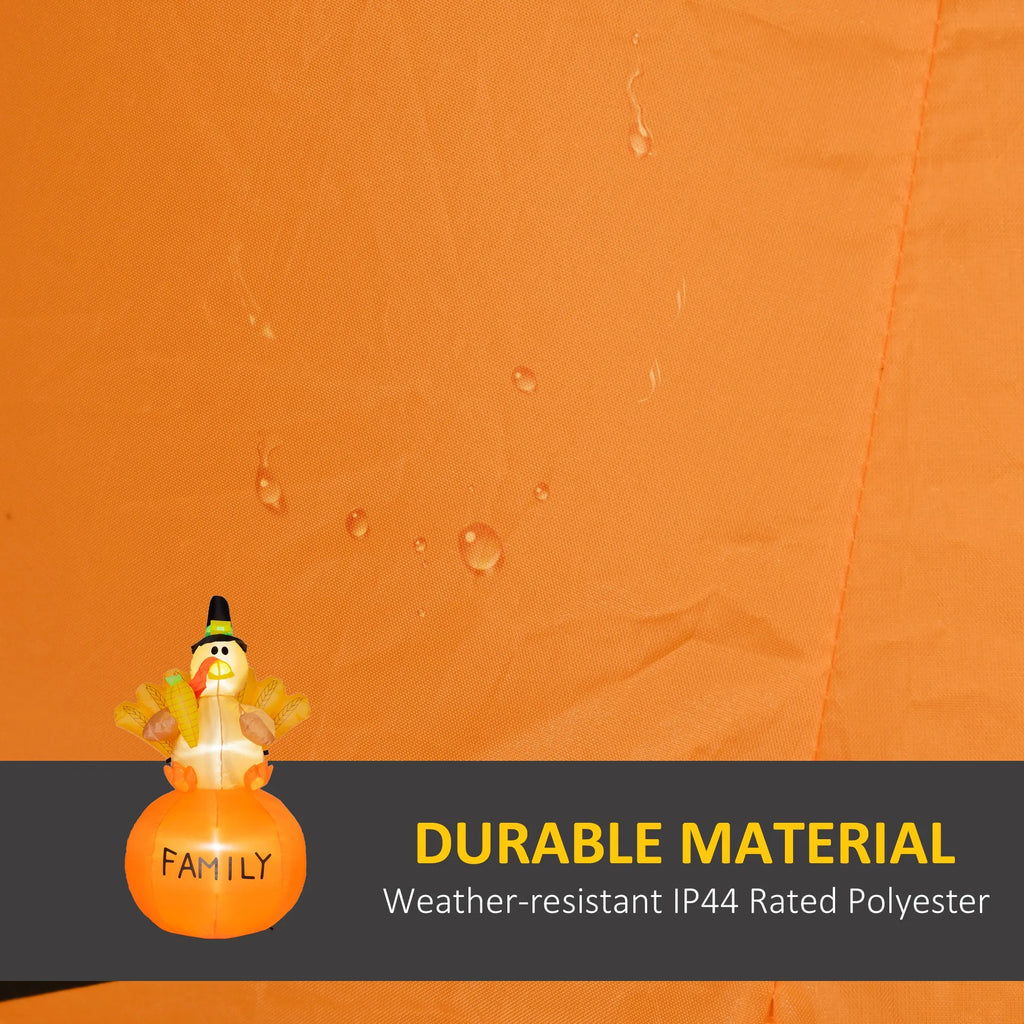 Close-up of the inflatable turkey's orange fabric with water droplets