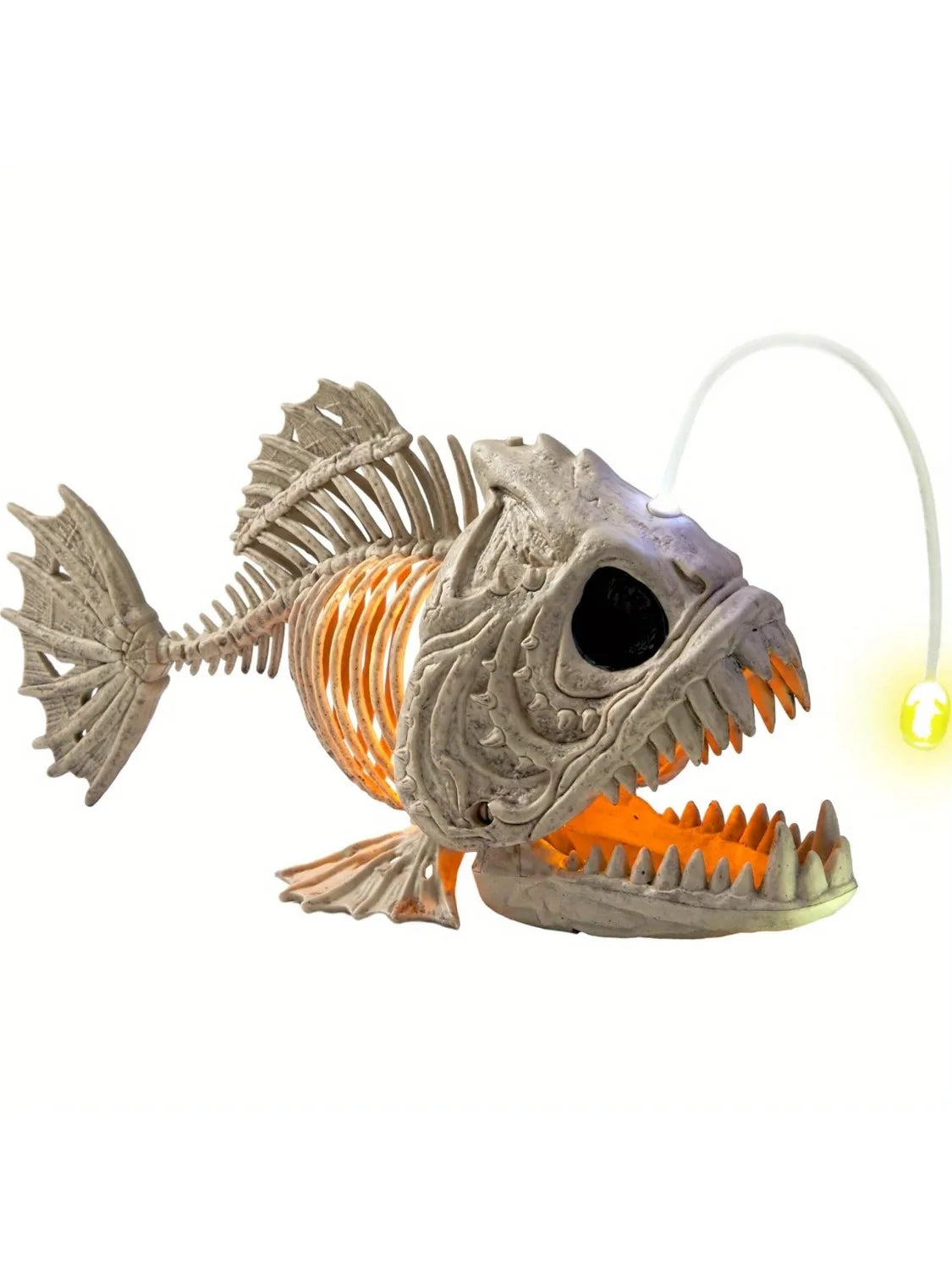 Halloween fish skeleton lantern with orange-lit ribs and mouth