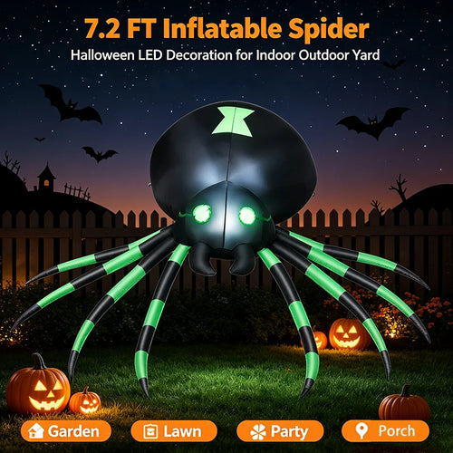 Giant inflatable spider glowing in a Halloween yard with jack-o'-lanterns at night